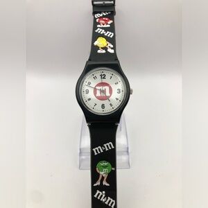 M&M watch all ages black band white face (needs battery) works perfect in box